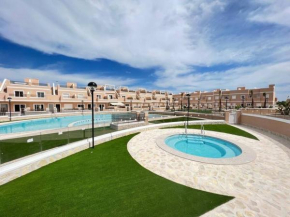 Apartment with private, heated jacuzzi, AC, pool